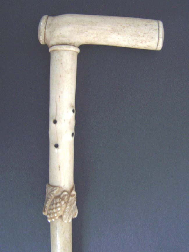 A 19th century ANTIQUE Whalebone Walking Stick with Carved Grapevine Decoration